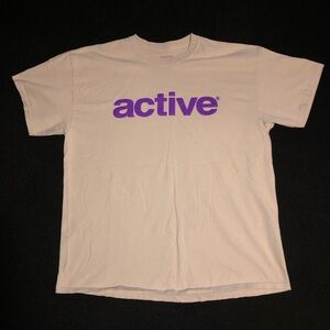 Active Ride Shop. Puff Print. Size XL. Cream/Purple color. Short Sleeve Shirt.